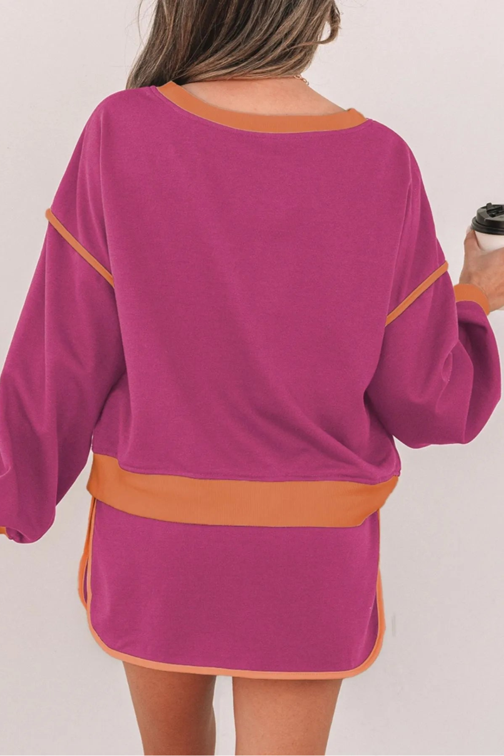 Two-piece skort set, pullover, oversized, long sleeve, drop shoulder, contrast trim, elastic waist, drawstring closure, slightly stretchy back view