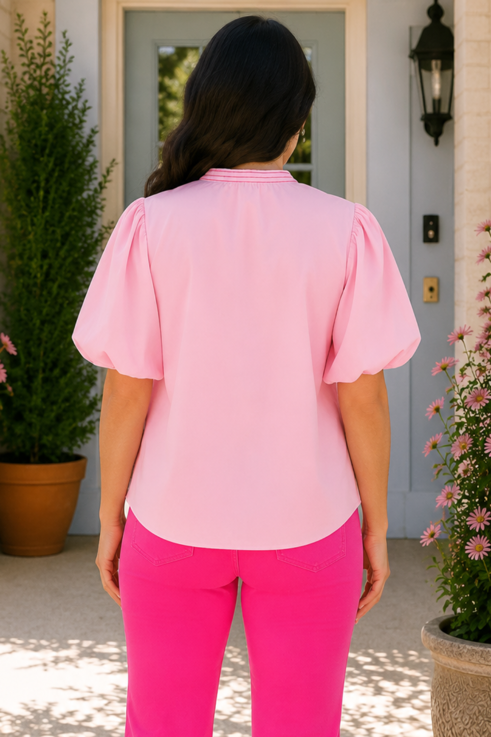 * Notched neck
* Buttoned
* Short puff sleeves
* Embroidered
* Slightly stretchy 