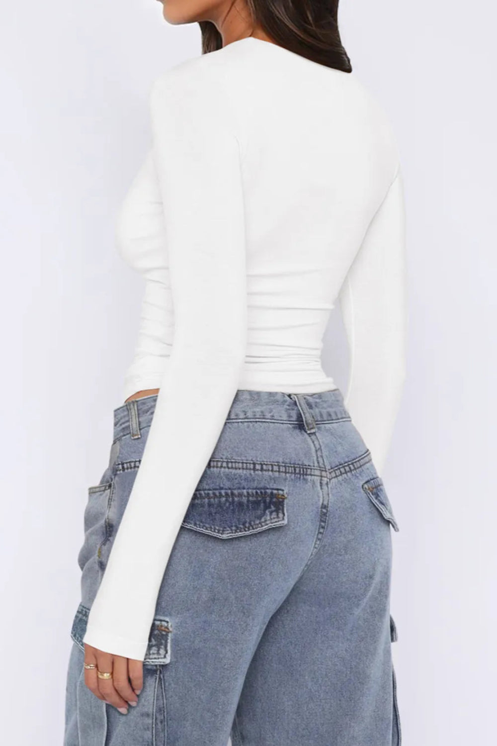 Top, asymmetrical neck, long sleeve, ruched, opaque, slightly stretchy, fitted, back view