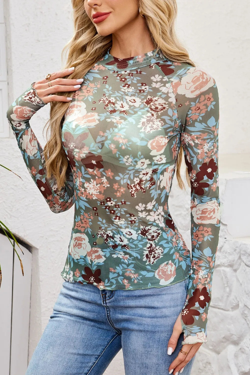 top, mesh, floral print, mock neck, long sleeve, thumb hole, stretchy, front view