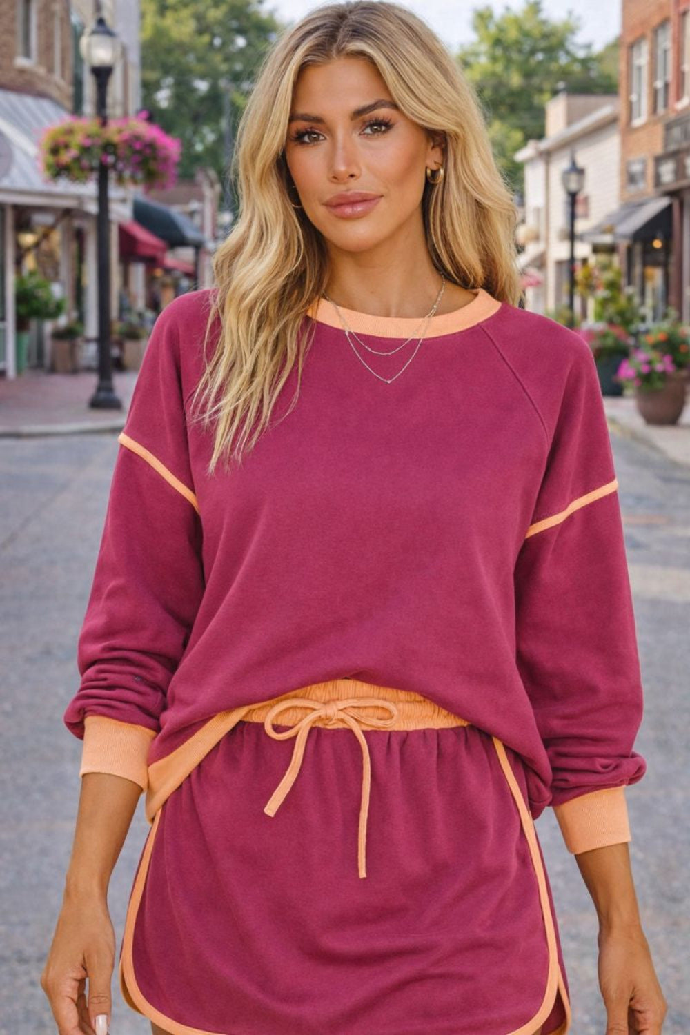 two-piece skort set, contrast trim, long sleeve, round neck, drop shoulder, ribbed, elastic waist, drawstring, pockets, slightly stretchy, front view