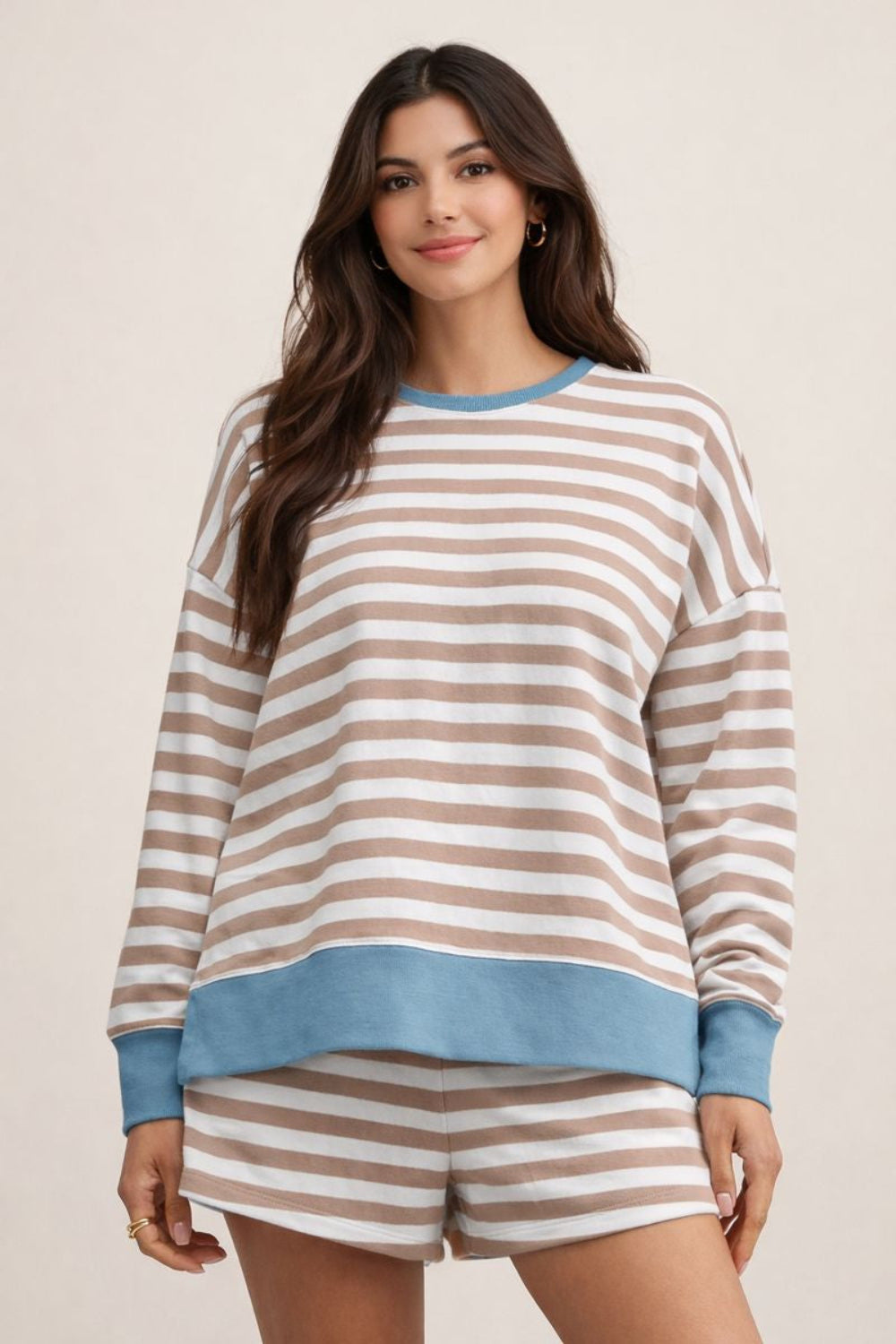 two-piece lounge set, color block, round neck, long sleeve, drop shoulder, side slit, high/low top, striped, drawstring shorts, no pockets, stretchy, front view