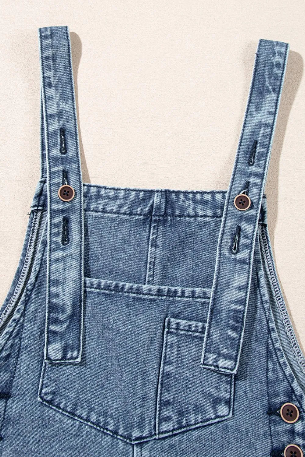 distressed, bib, pocket, wide-leg, denim overalls close up front view