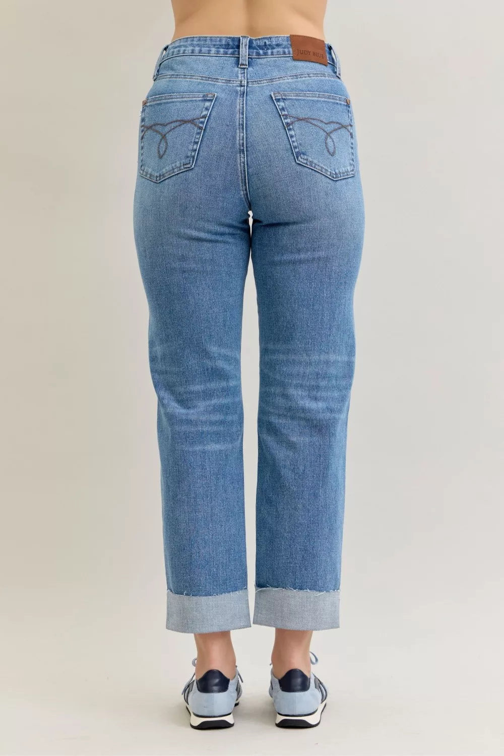 Judy Blue Jeans, high-rise, criss-cross front, mild destroy, single cuff, belt loops, button/zipper closure, pocketed, medium wash, slightly stretchy, back view