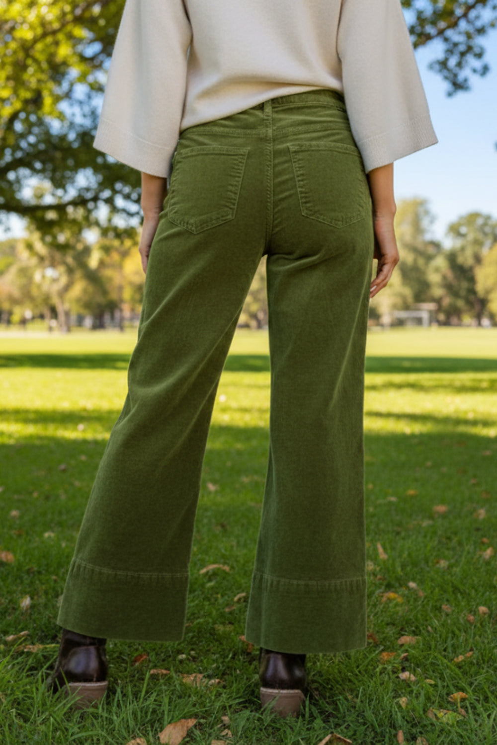 Pants, corduroy, high waist, wide leg, pocketed, belt loops, button/zipper closure, some stretch, back view