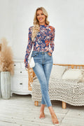 top, mesh, floral print, mock neck, long sleeve, thumb hole, stretchy, front view