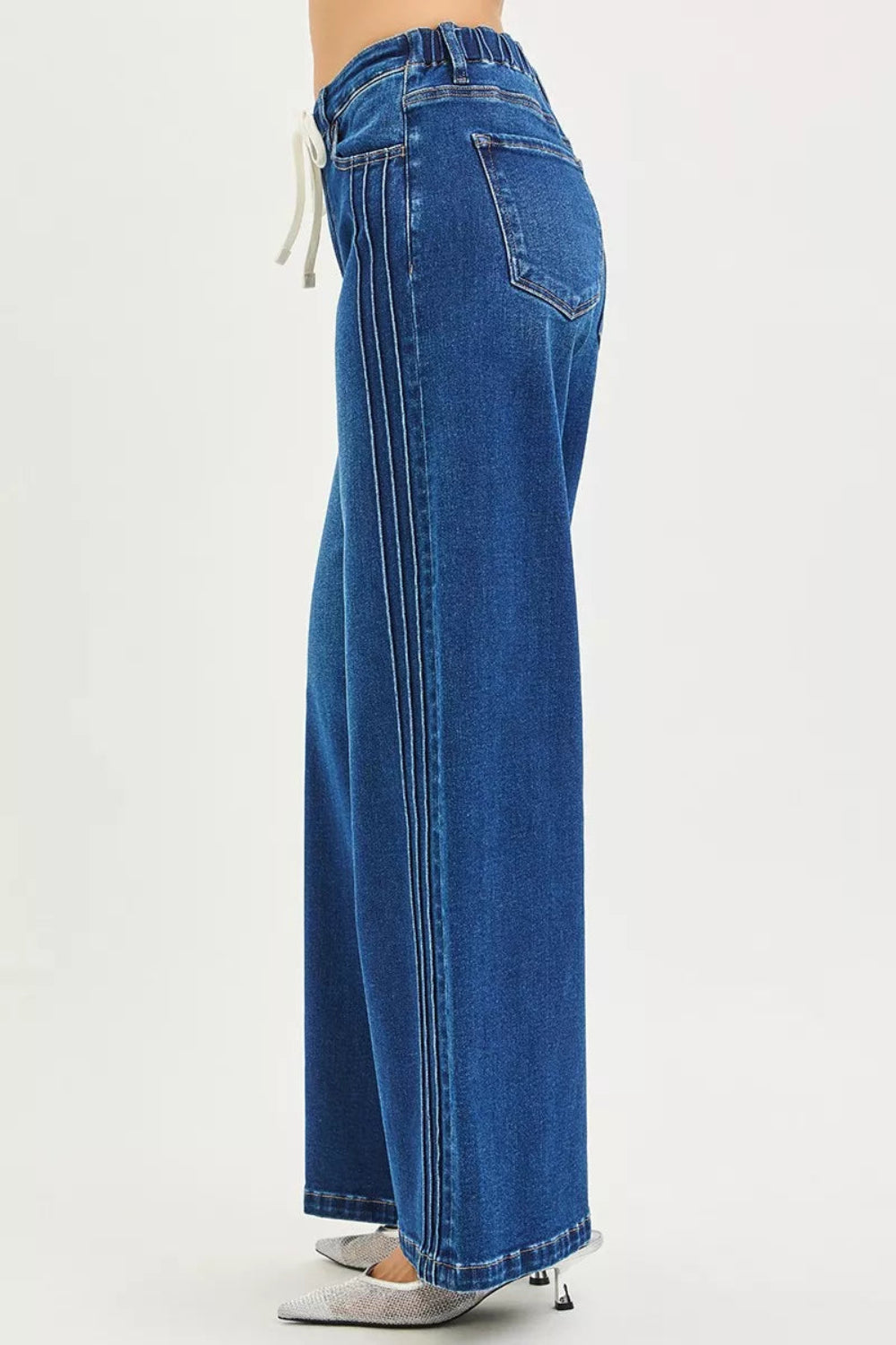 Risen Jeans, full-size, mid-rise, side pin tuck, wide leg, belt loops, elastic waist in back, drawstring closure, pocketed, dark wash, slightly stretchy, side view
