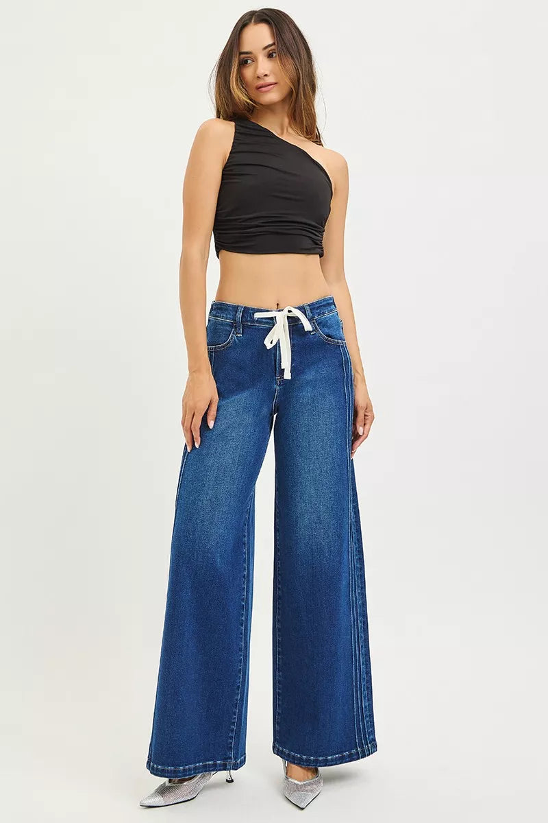 Risen Jeans, full-size, mid-rise, side pin tuck, wide leg, belt loops, elastic waist in back, drawstring closure, pocketed, dark wash, slightly stretchy, front view
