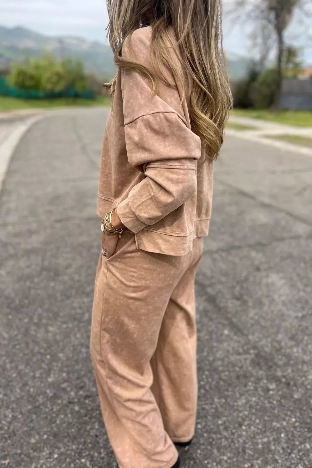Two-piece pant set, pullover, long sleeve, drop shoulder, round neck, exposed seam,  side slit, elastic waist, drawstring, pocketed, stretchy, side view

