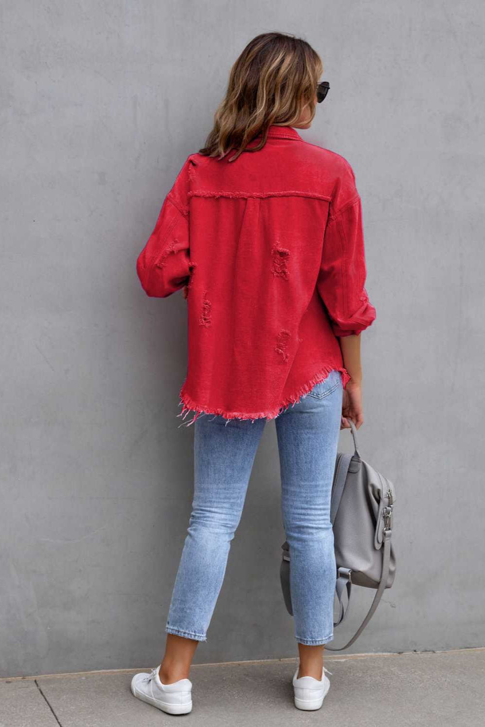 denim jacket, long sleeve, collared, buttoned, buttoned front patch pockets, distressed, fringed/raw hem, no stretch, multiple colors, back view