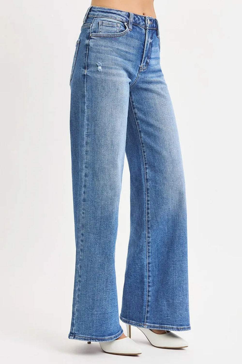 Risen jeans, full-size, high-rise, wide leg, vintage medium wash, 5-pocket detail, button-zipper closure, belt loop detail, slightly stretchy, distressed, side view