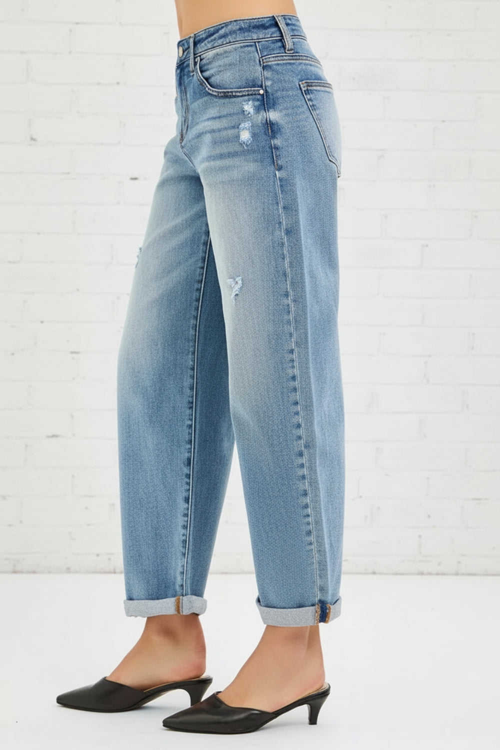 Risen Jeans, full-size, mid-rise, slouchy, ankle length, barrel, cuffed, distressed, belt loops, pocketed, button/zipper closure, medium wash, slightly stretchy, side view
