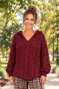 * Sweater
* Hooded
* Long sleeve
* Cable-knit
* Oversized
* Slightly stretchy