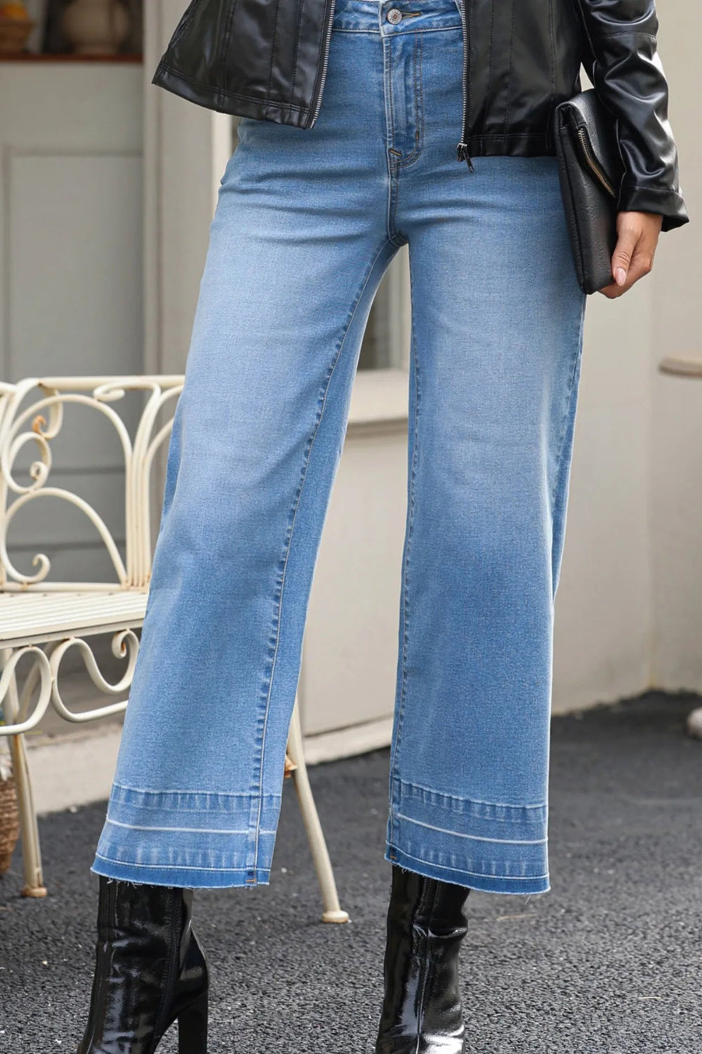 Jeans, high-rise, drop hem, raw hem, wide leg, pocketed, belt loops, button/zipper closure, vintage wash, some stretch, front view