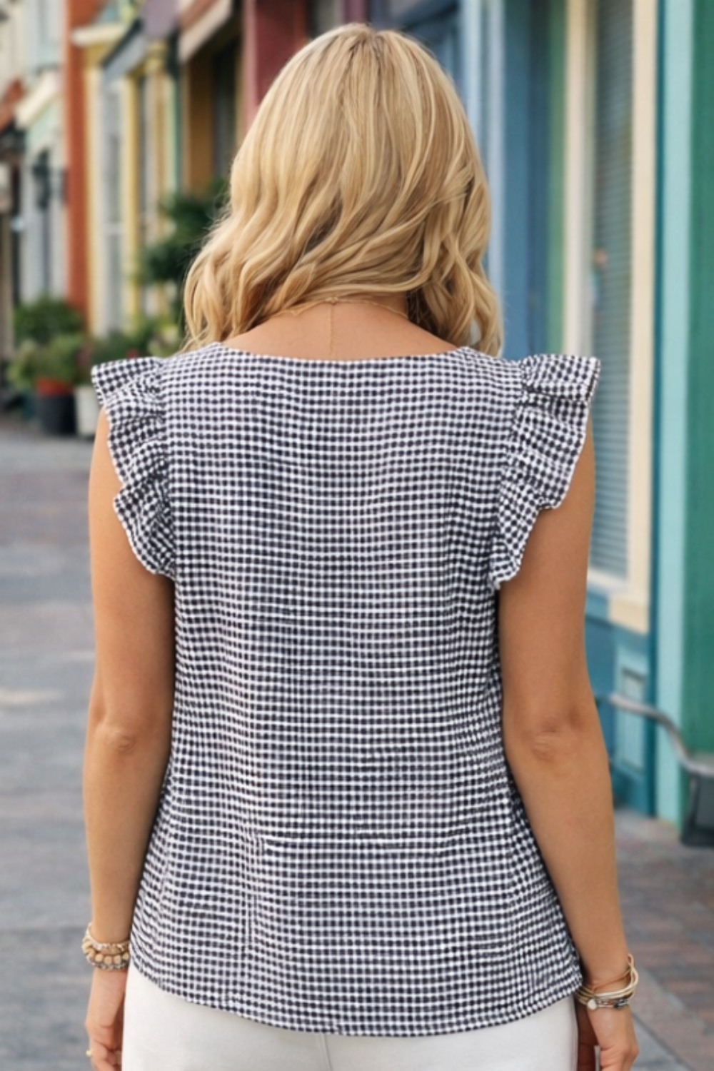 * Gingham top
* Square neck
* Ruffled sleeves
* No stretch