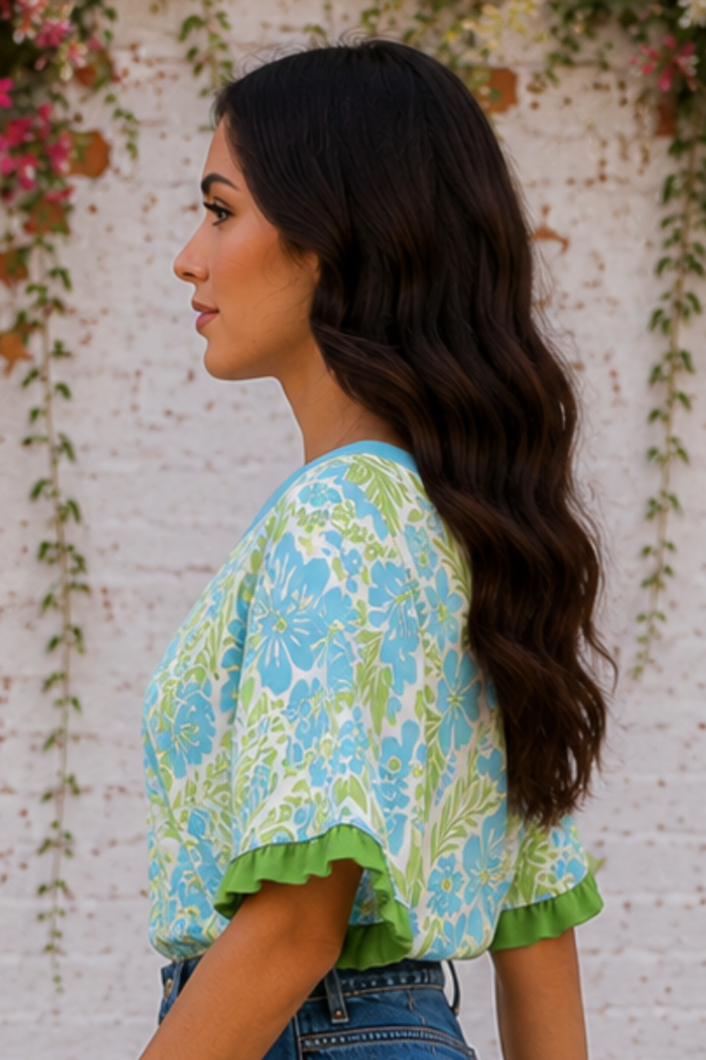 * Pullover
* Round neck
* Half sleeve
* Color block
* Ruffled
* Floral print
* Round hem
* No stretch