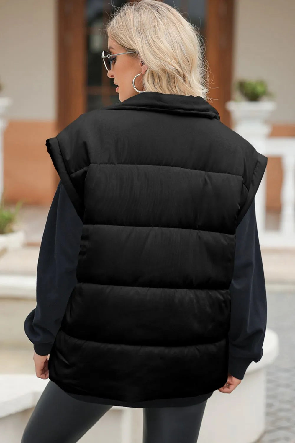 Puffer vest, insulated, lined, collar, zippered, pocketed, oversized, sleeveless, no stretch, back view