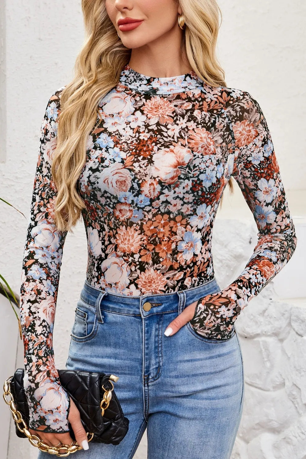 top, mesh, floral print, mock neck, long sleeve, thumb hole, stretchy, front view
