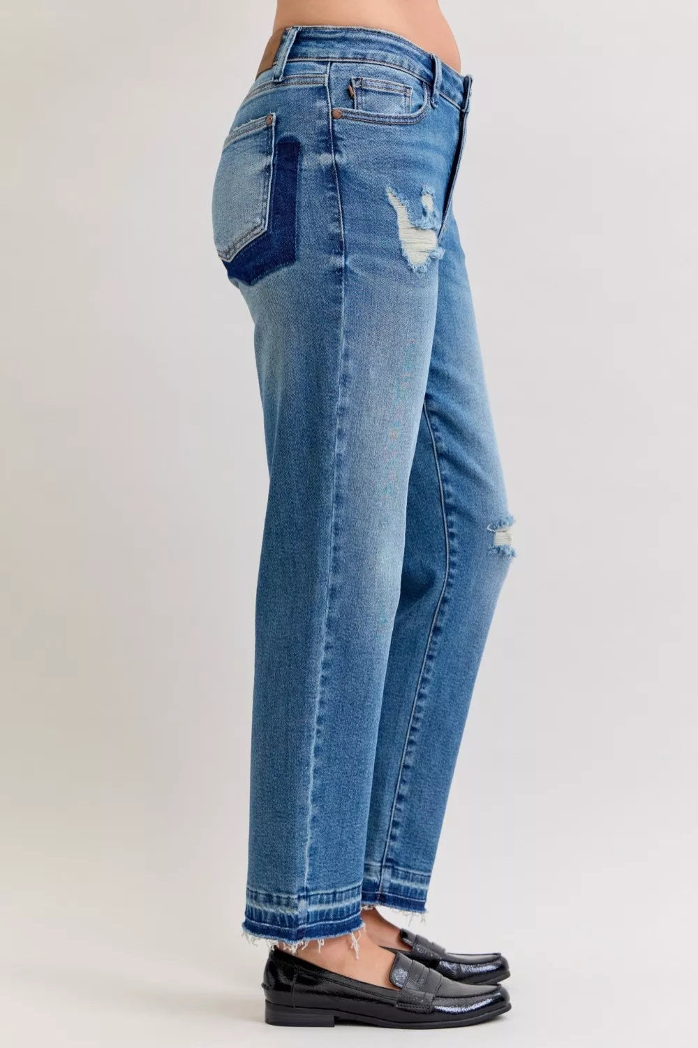 Judy Blue Jeans, full-size, mid-rise, boyfriend, patch & repair, distressed, release hem, raw hem, medium wash, button/zipper closure, belt loops, pocketed, slightly stretchy, side view
