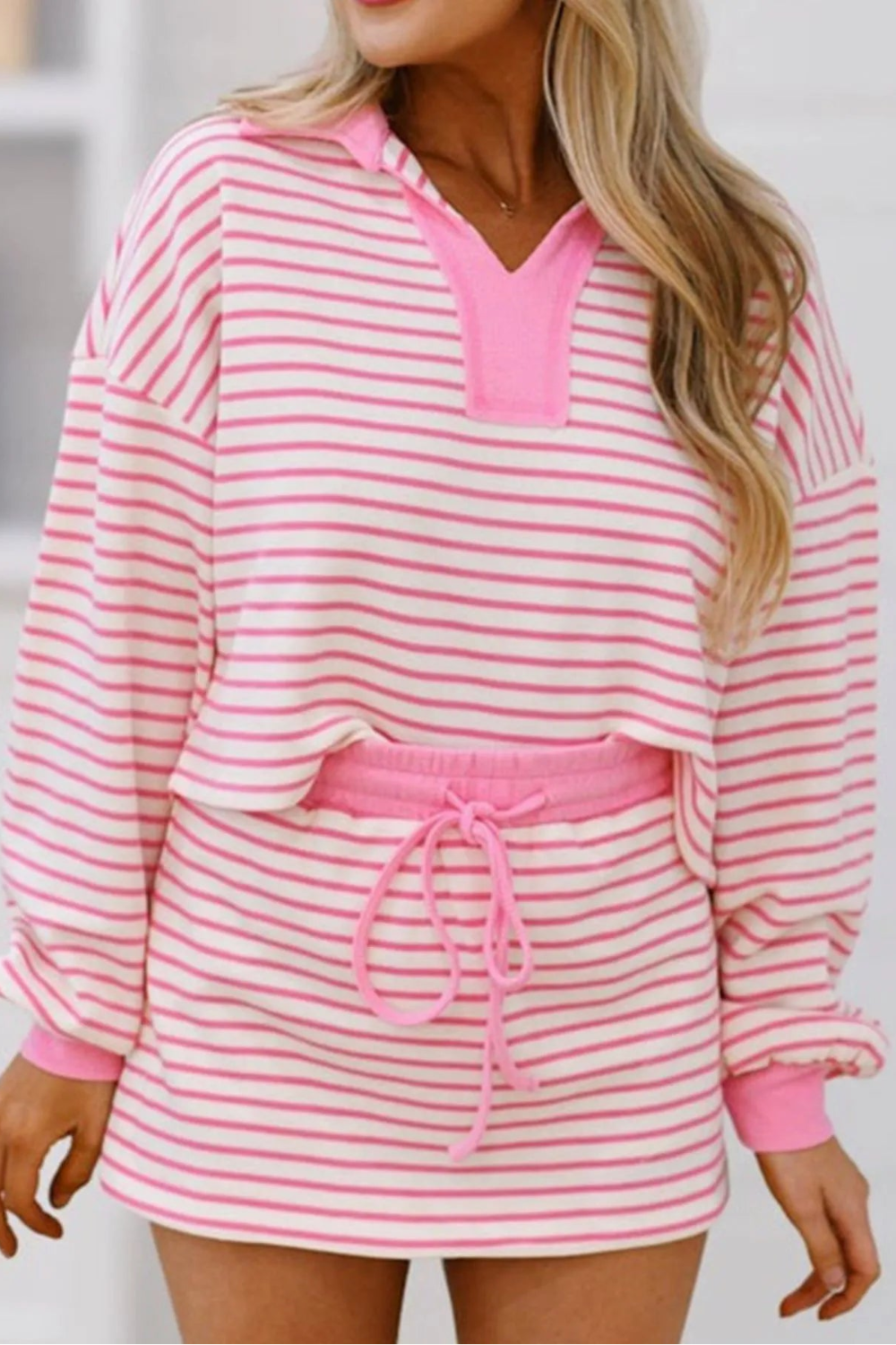 Two-piece mini skirt set, pullover, collared, drop shoulder, long sleeve, striped, sets at the waist, elastic waist, drawstring closure, slightly stretchy front view