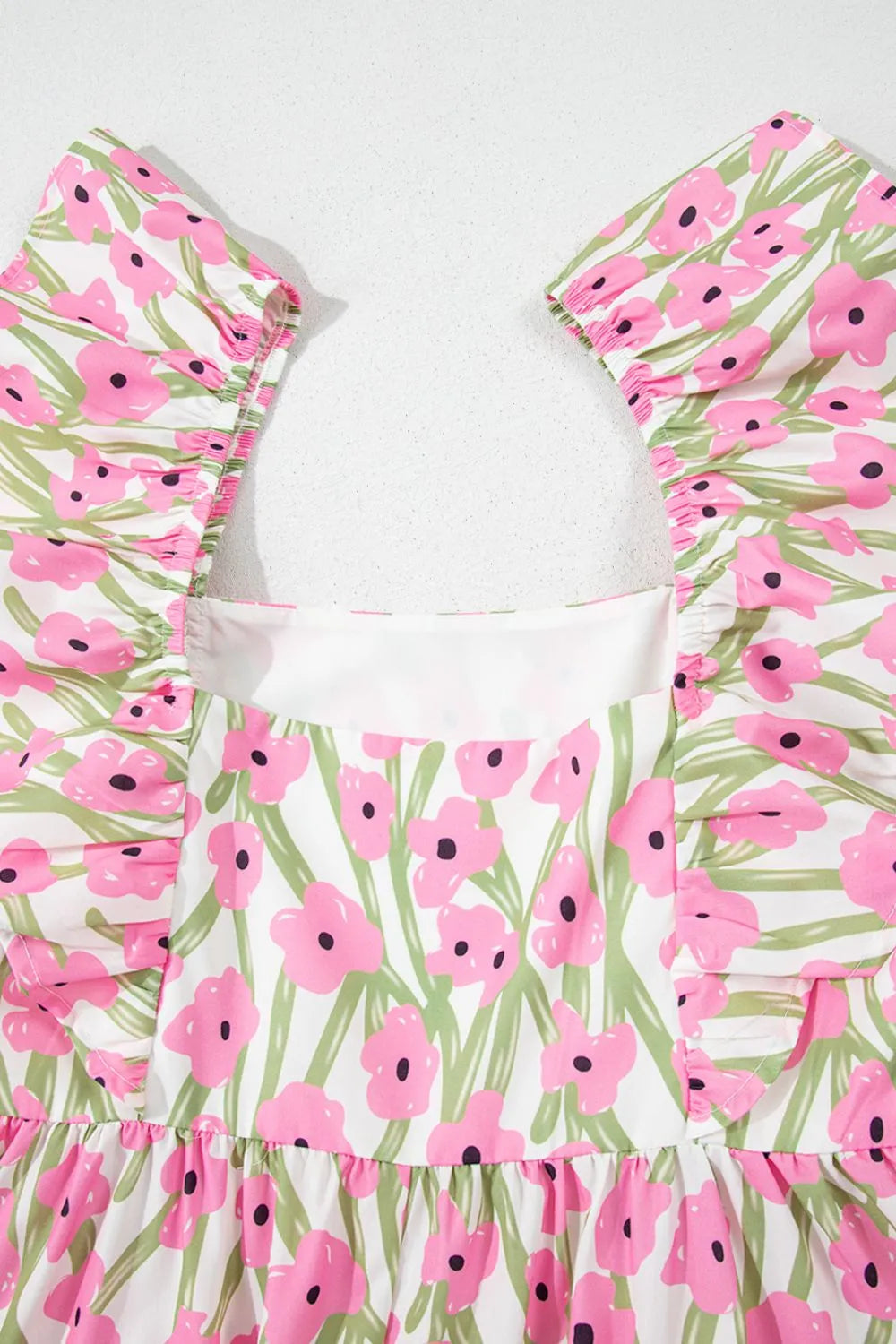 Maxi dress, floral print, sleeveless, ruffled straps, square neck, tiered, opaque, unlined, pocketed, no elasticity close up view
