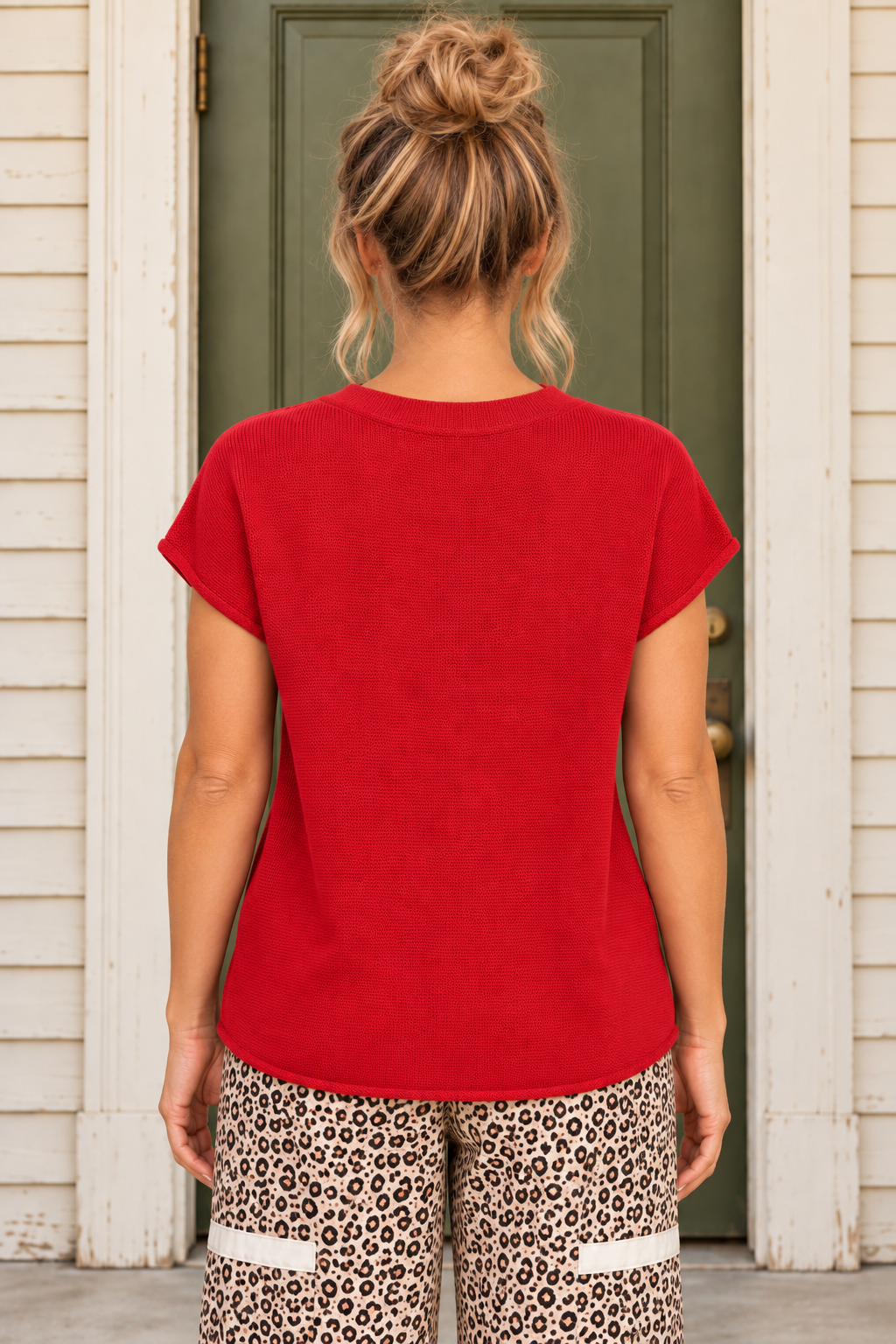 Just Like That Top in red knit with short cuffed sleeves, a crew neckline, and center-front seam, shown from the back.