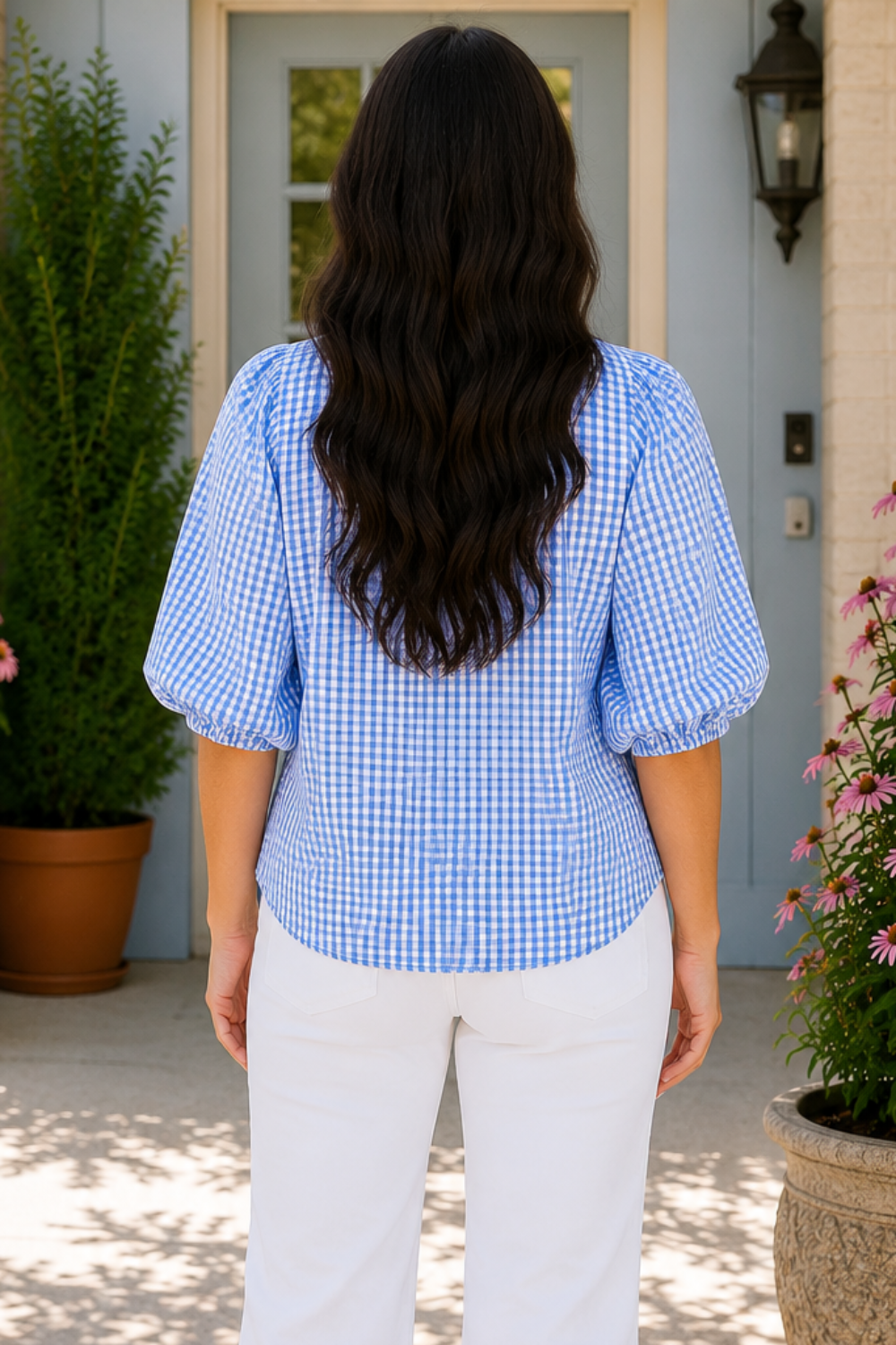* V-neck
* Ruffled neck
* Buttoned
* Short puff sleeves
* Pleated
* Slightly stretchy
