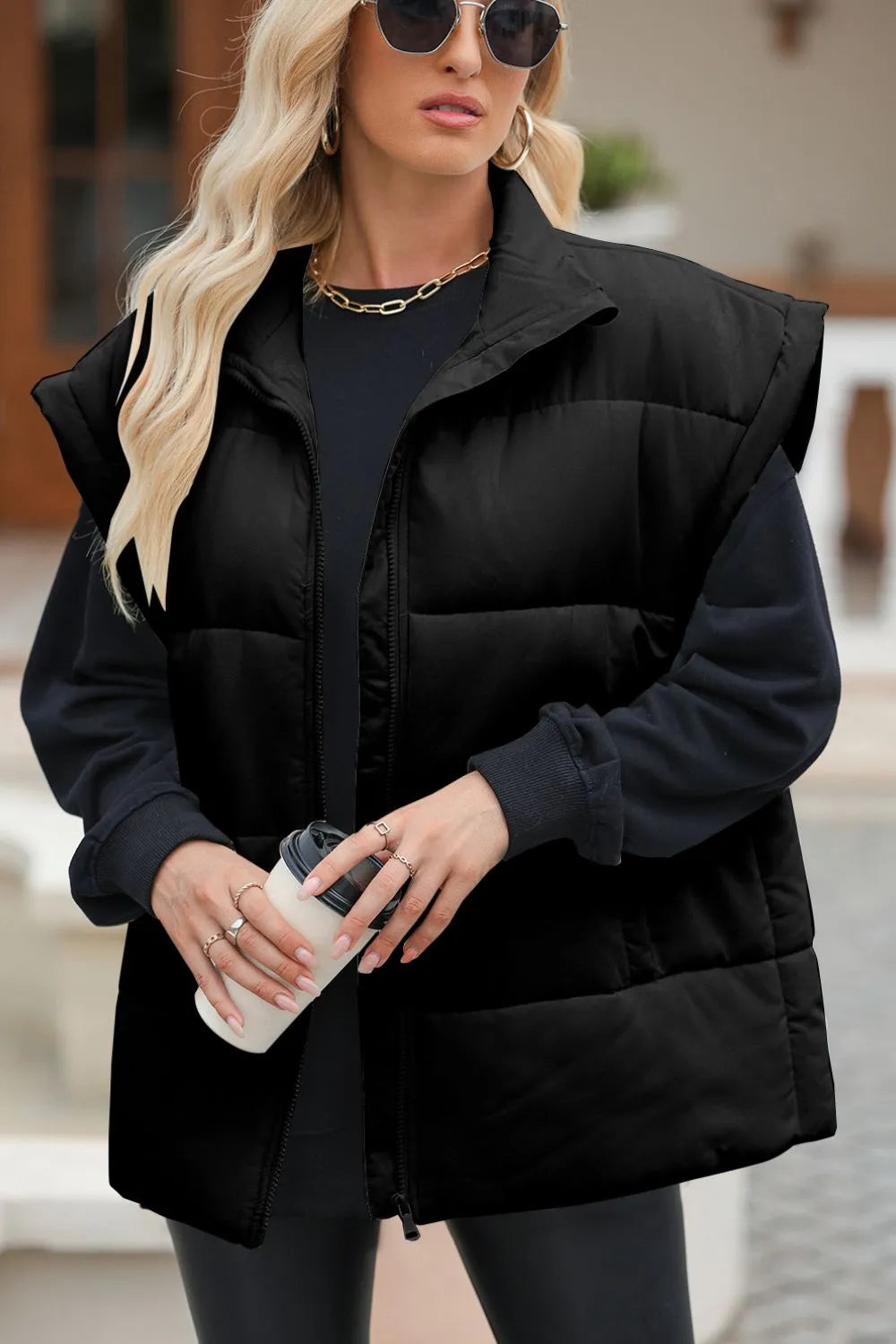 Puffer vest, insulated, lined, collar, zippered, pocketed, oversized, sleeveless, no stretch, front view