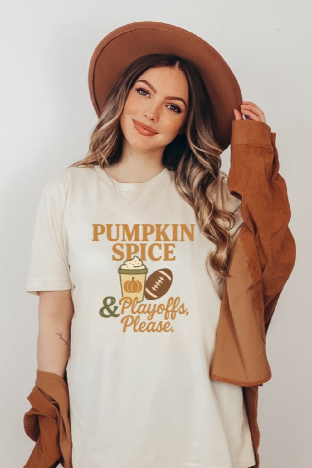 Pumpkin spice & Playoffs Please graphic t-shirt, front view