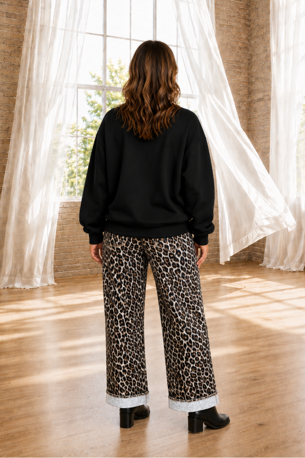 * Jeans
* Leopard print
* Button/zipper closure
* Belt loops
* Pocketed
* Back elastic waist
* Straight loose leg
* Frayed hem
* No stretch