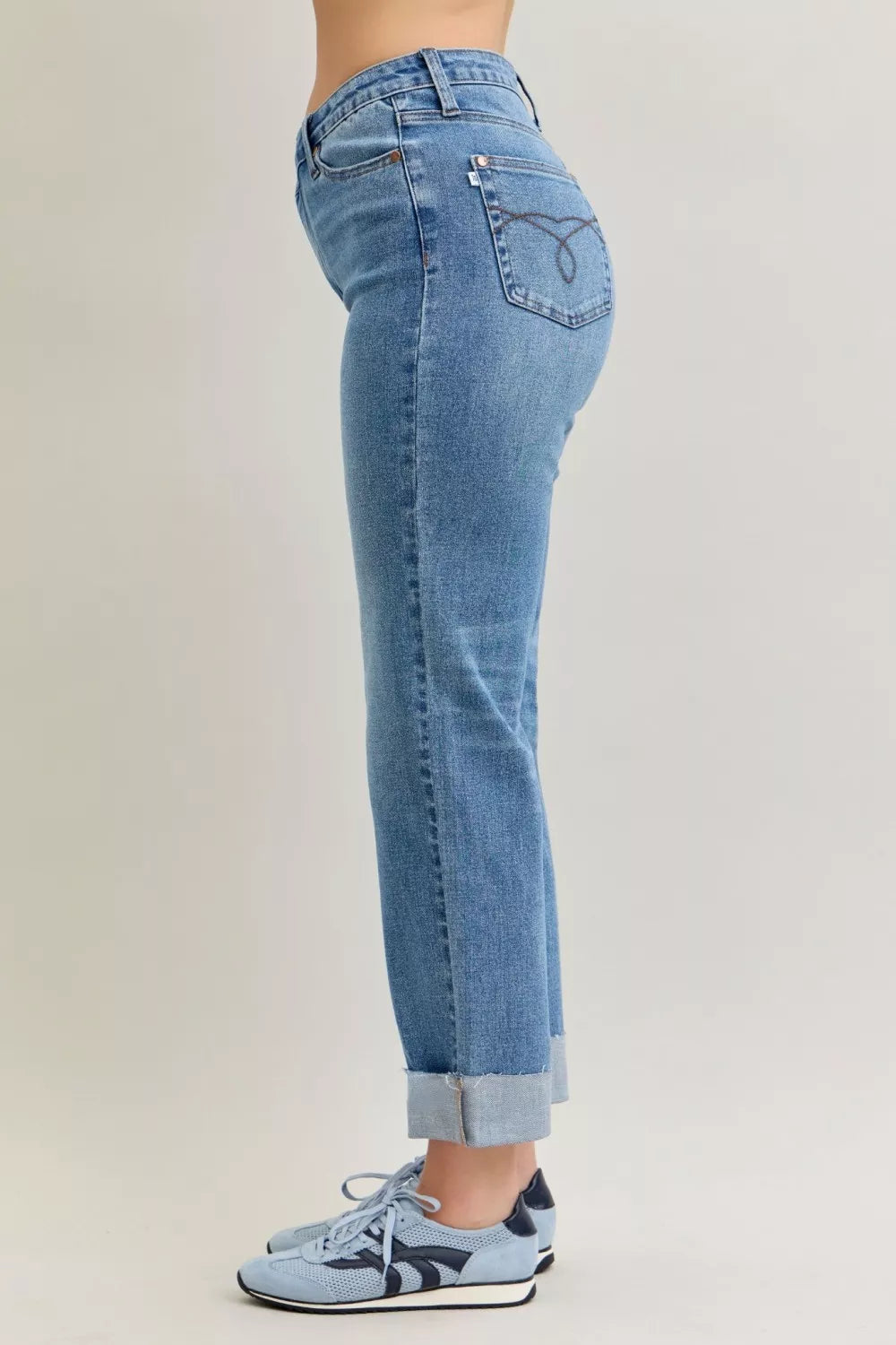 Judy Blue Jeans, high-rise, criss-cross front, mild destroy, single cuff, belt loops, button/zipper closure, pocketed, medium wash, slightly stretchy, side view