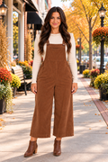 Front view wide-leg overalls, bibbed, pocketed, corduroy, adjustable straps, no stretch.