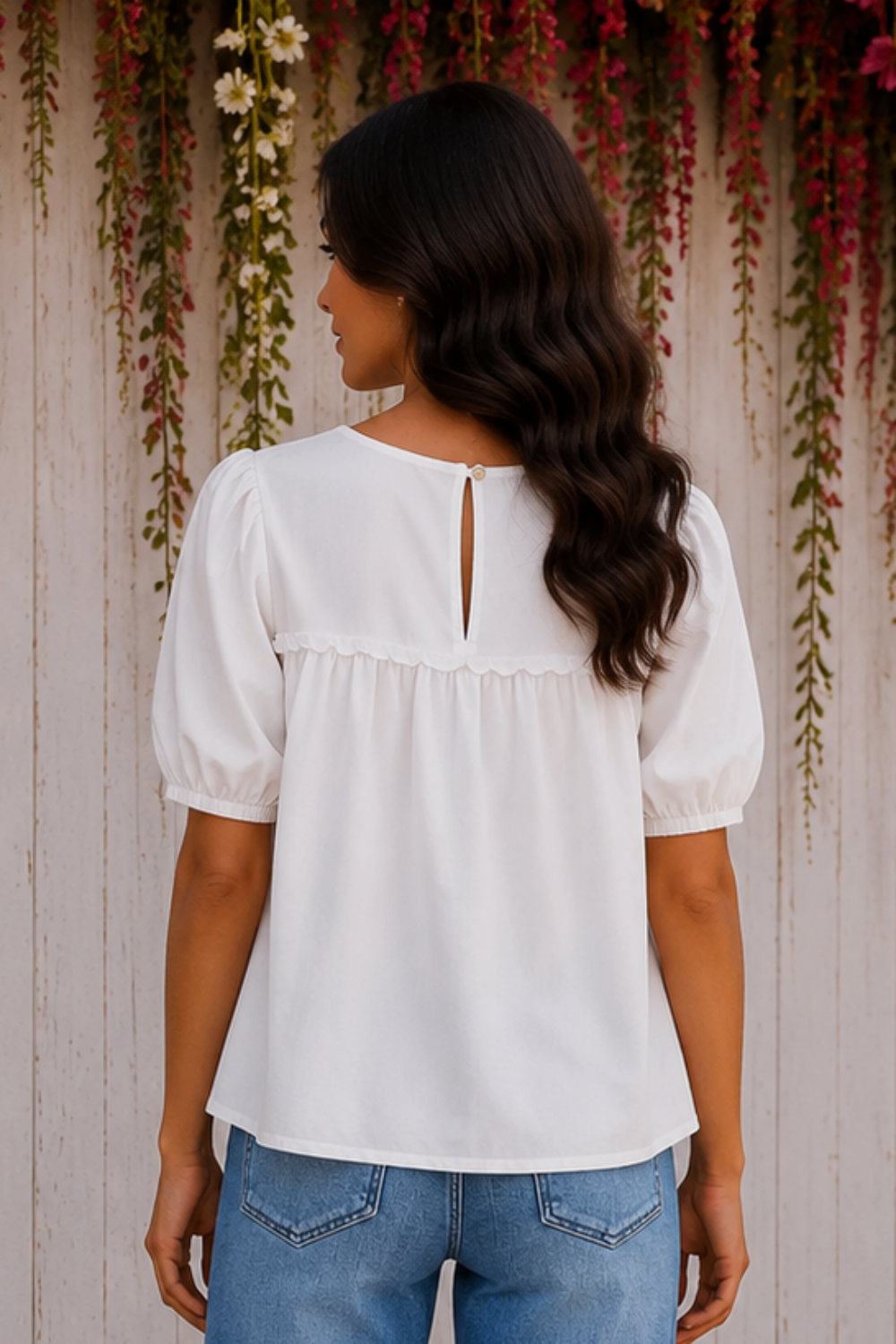 * Round neck
* Short puff sleeve
* Smocked
* Tiered
* Ruffled
* Keyhole closure
* No stretch