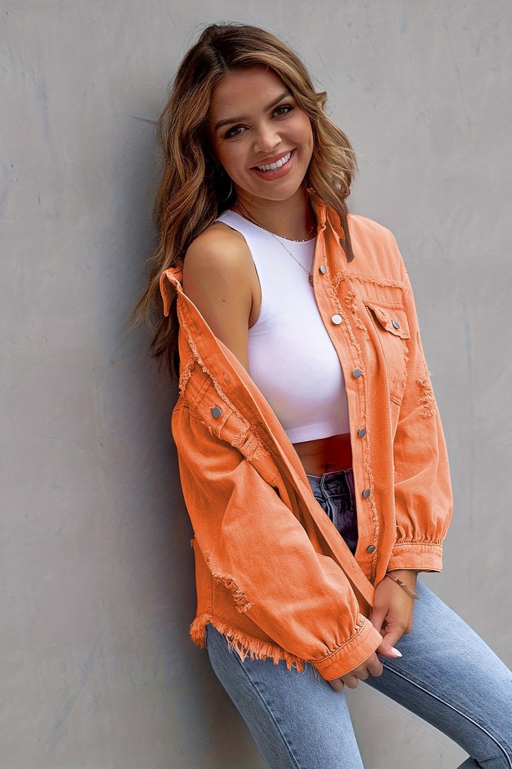 denim jacket, long sleeve, collared, buttoned, buttoned front patch pockets, distressed, fringed/raw hem, no stretch, multiple colors, front view