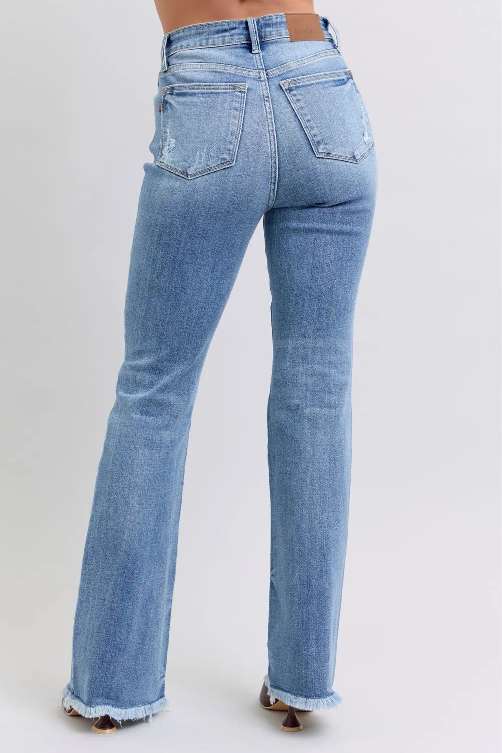 JUDY BLUE FULL-SIZE HIGH-RISE RAW HEM BOOTCUT JEANS BACK VIEW