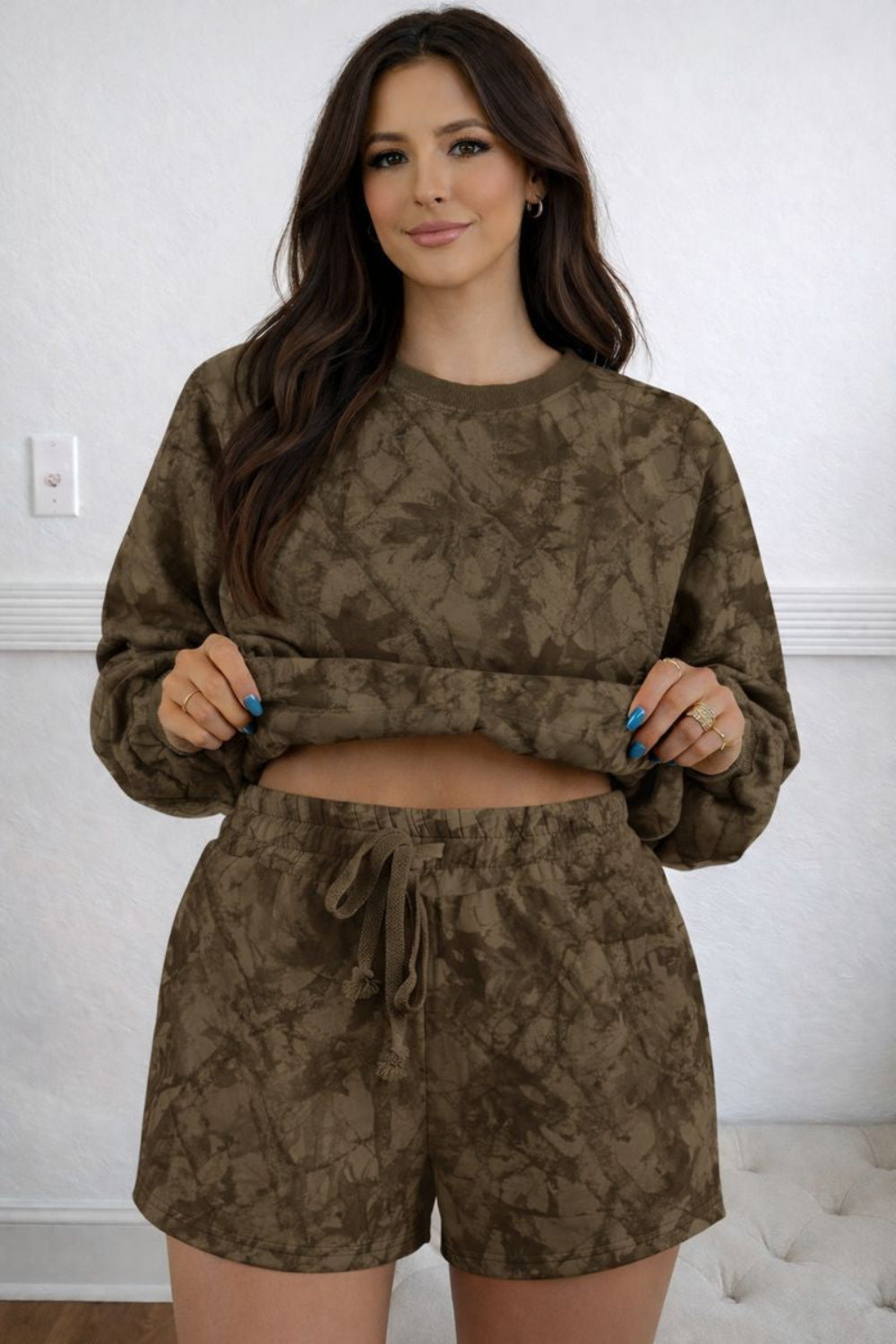 Two-piece lounge set, pullover, round neck, drop shoulder, long sleeve, ribbed, oversized, drawstring shorts, elastic waist, pocketed, no stretch, front view 
