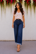 * Solid dark wash
* Mid-rise
* Slouchy
* Cropped
* Cuffed hem
* Button/zipper closure
* Belt loops
* Pocketed
* Stretchy