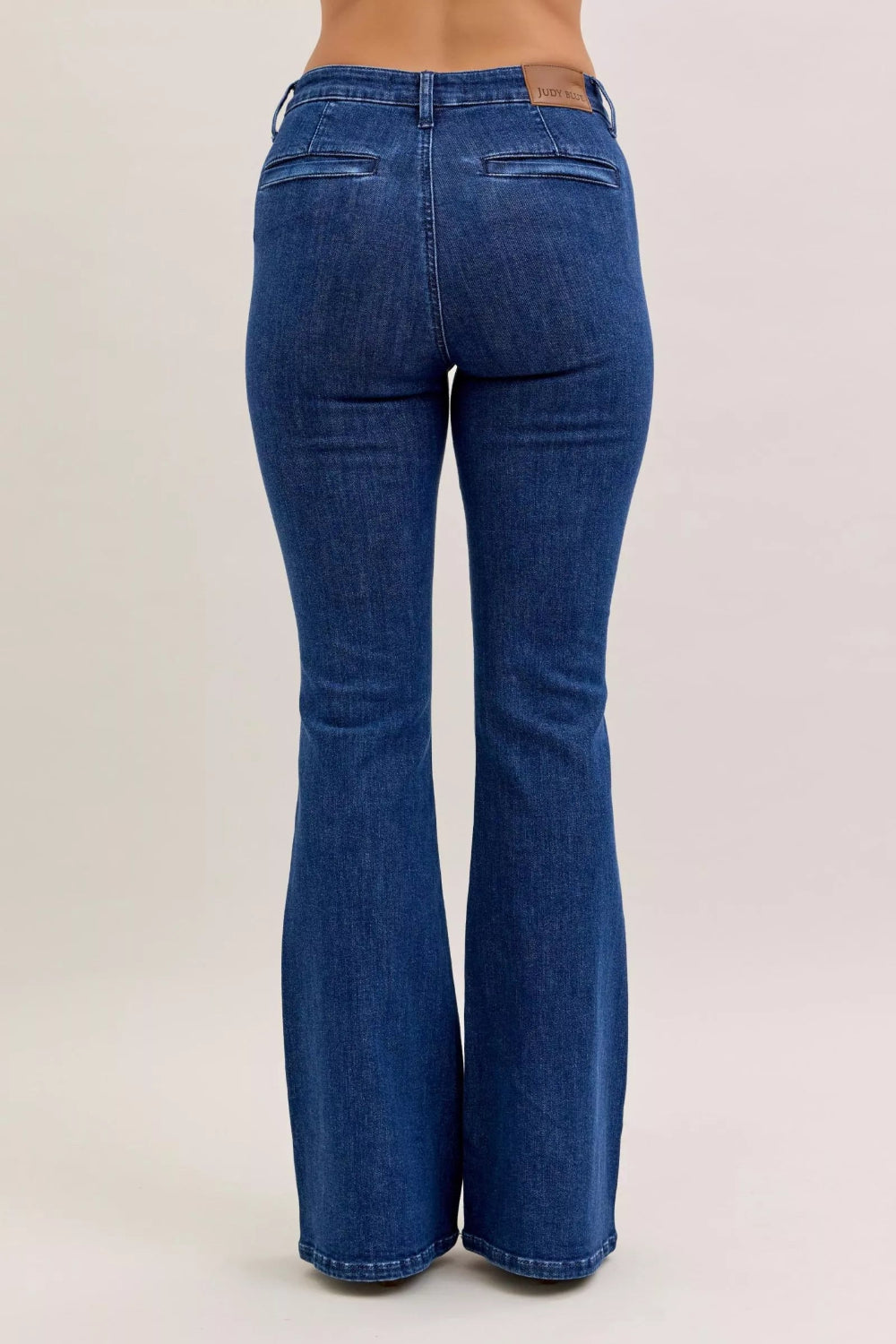 Judy Blue Jeans, high-rise, front patch pockets, flared, dark wash, belt loops, back pockets, button/zipper closure, slightly stretchy, back view
