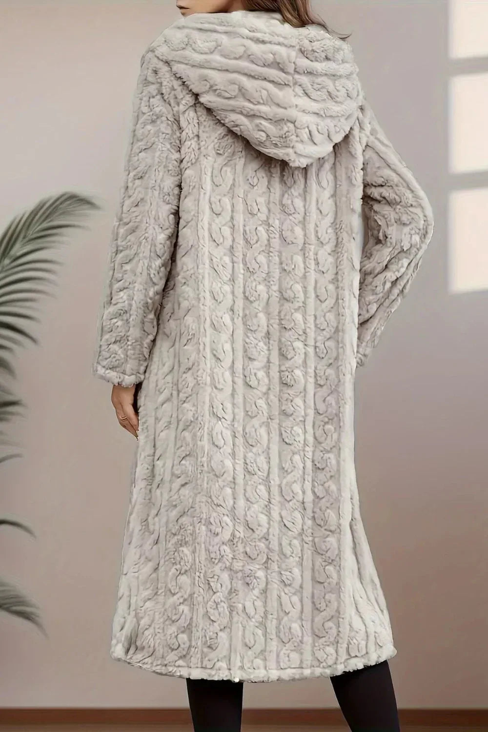 Longline coat, hooded, buttoned, pocketed, thick, lined, oversized, cable-knit design, some stretch, back view