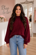 * Mock neck sweater
* Textured knit
* Drop shoulder
* Long sleeve
* Slightly stretchy