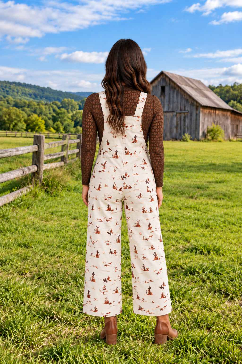 Back view of The Cowboy Way Overalls in cream with a Western desert print, adjustable straps, bib pocket, and wide legs.