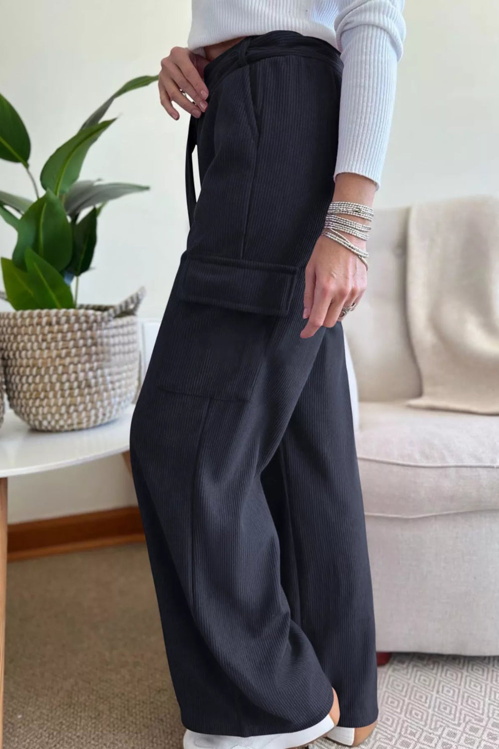 Pants, high-waist, belted, looped, elastic waist, wide leg, corduroy, front and side pockets, not stretch, side view
