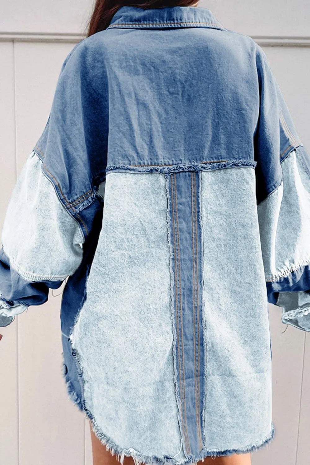 Denim jacket, colorblock, button down, raw hem, pockets, collared, no stretch, exposed seams back view