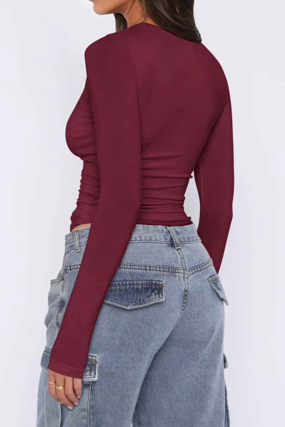 Top, asymmetrical neck, long sleeve, ruched, opaque, slightly stretchy, fitted, back view