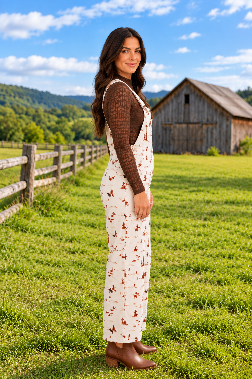 Side view of The Cowboy Way Overalls in cream with a Western desert print, adjustable straps, bib pocket, and wide legs.