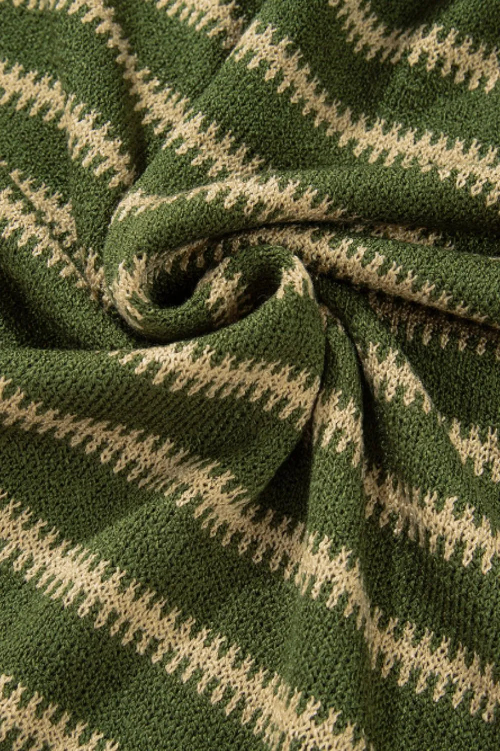 * Striped sweater close up
* Round neck
* Drop shoulder
* Long sleeve
* Exposed seam
* Slightly stretchy