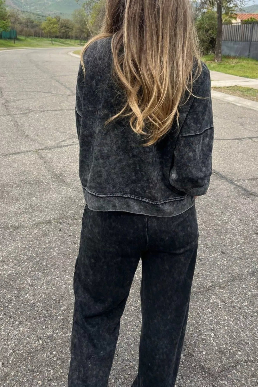 Two-piece pant set, pullover, long sleeve, drop shoulder, round neck, exposed seam,  side slit, elastic waist, drawstring, pocketed, stretchy, back view