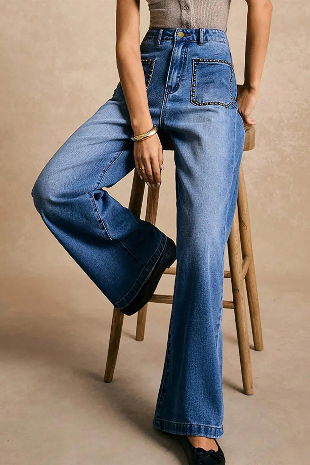 Jeans, high-waist, wide leg, front patch pockets, brads, pocketed, belt loops, button/zipper closure, medium vintage wash, slightly stretchy, front view
