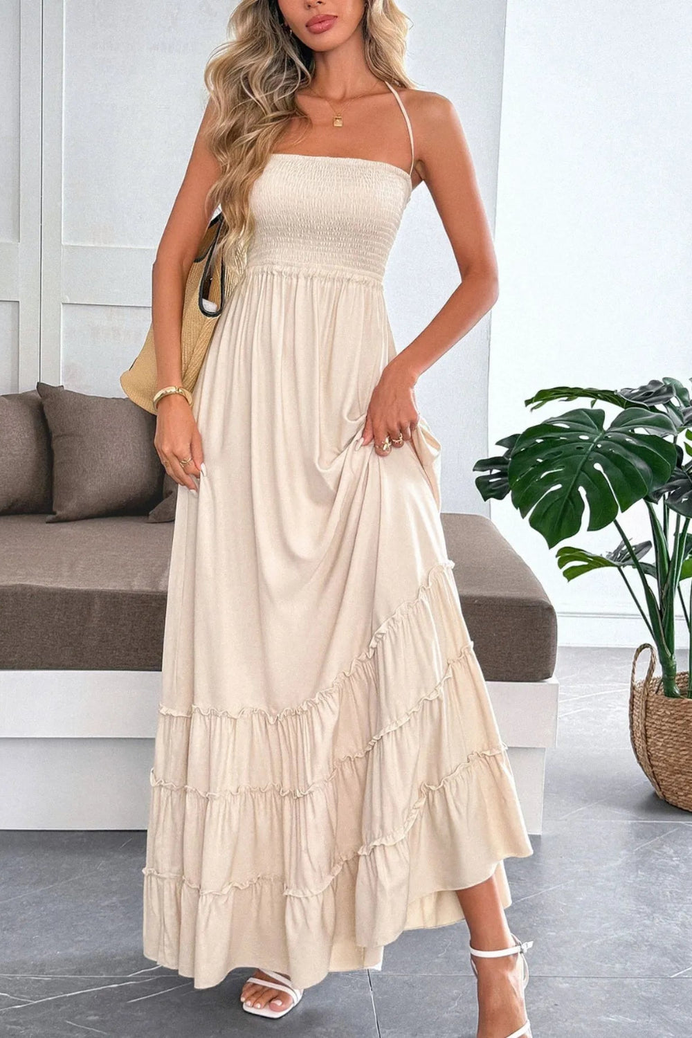 Maxi dress, halter tied, sleeveless, smocked, tiered, ruffled, frilled, backless, unlined, slightly stretchy, front view