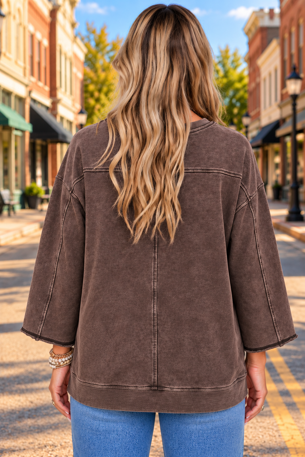 Always On Time Top in washed mocha brown with subtle textured pattern, relaxed fit, wide long sleeves, V-stitch neckline and ribbed hem.
